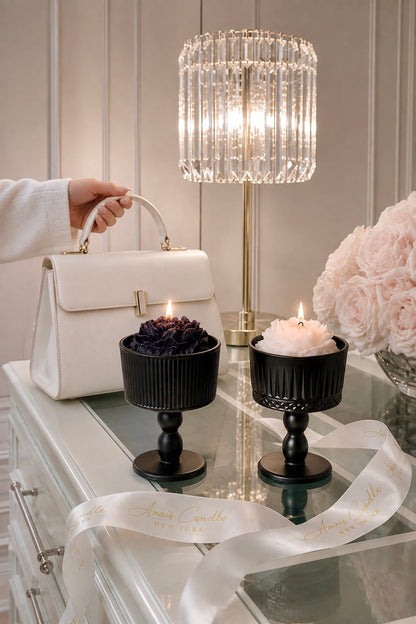 Fleur de Paris Set of 2 Candles placed near the Arc de Triomphe in Paris