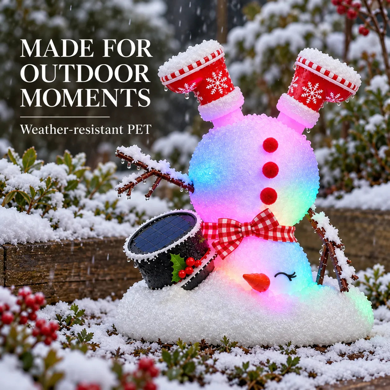 Weather-resistant solar snowman figurine displayed in snowy outdoor garden surroundings