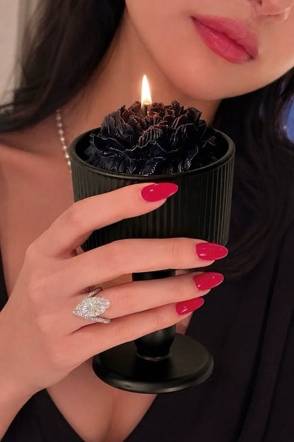 Fleur de Paris Set of 2 Candles staged on the steps of the Louvre in Paris