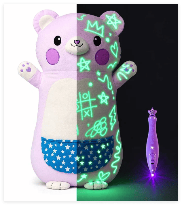 Lavender bear plush showing plain fabric and glowing light-drawn patterns side by side