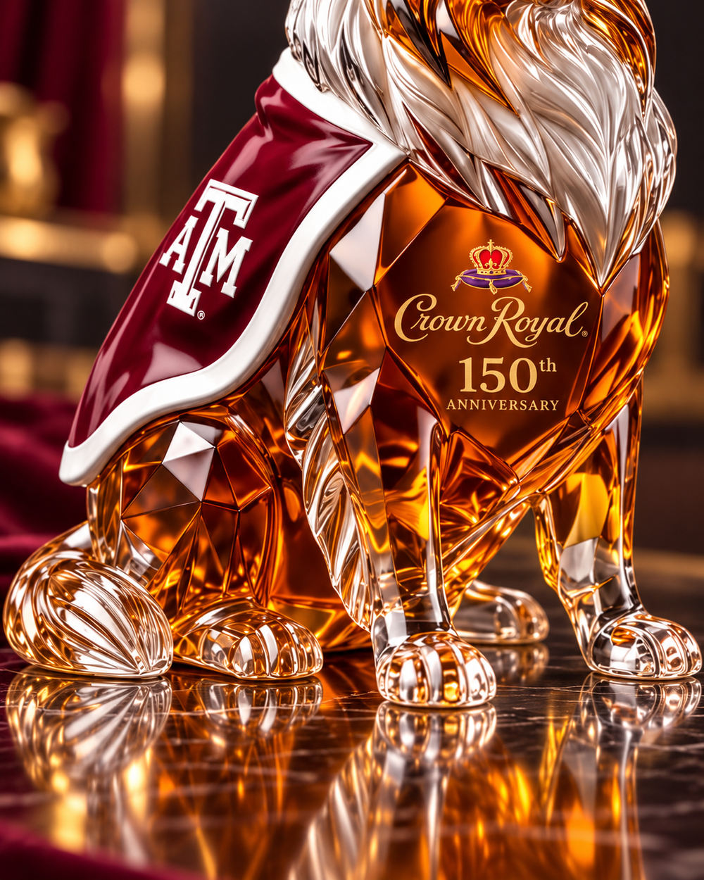 Close-up of maroon A&M cape and 150th anniversary detailing on decanter